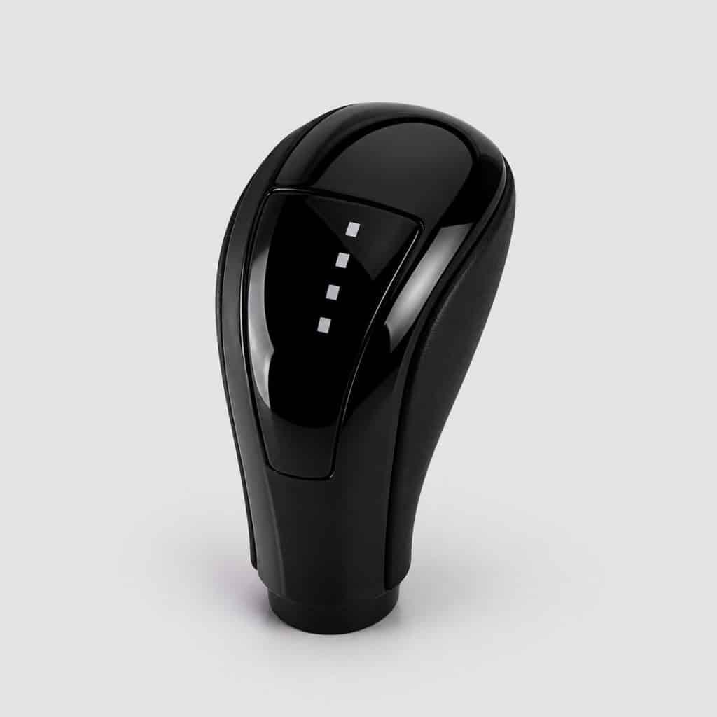 Pommeau de sélecteur pour boîte automatique présenté seul sur fond clair